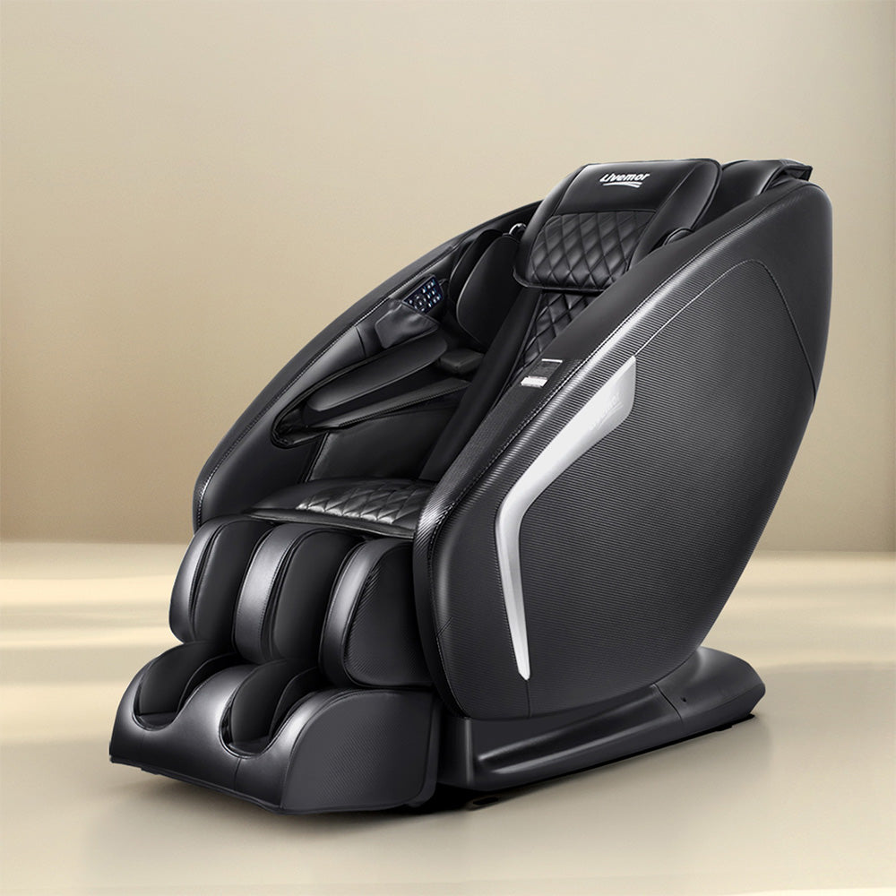 Black massage chair on a beige background