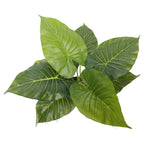 Artificial green leaves on a white background